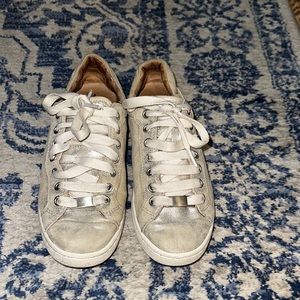 Gold distressed UGG sneakers